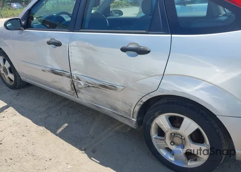 2005 Ford Focus Zx5 z USA, uszkodzony, nr VIN 3FAFP37N95R106453